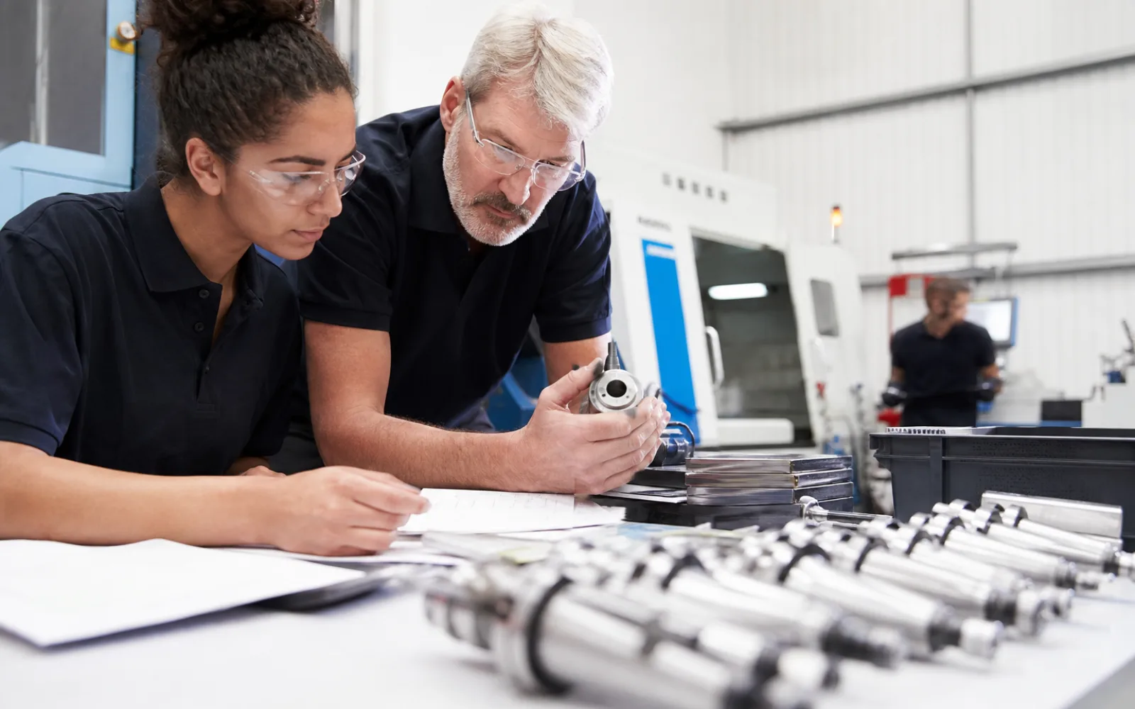 UK engineering team reviewing test results and project drawings for a technical case study